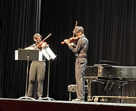 Caption: Drew Kim (right) and Dylan Kim (left) perform Duo concertante in D major by Louis Spohr