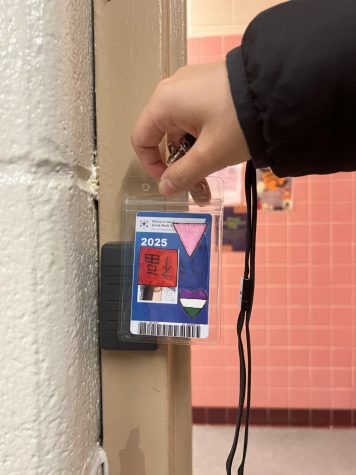 Opened Doors, Unscanned IDs–a student brings their ID up to the card reader, but the bathroom door is unlocked.