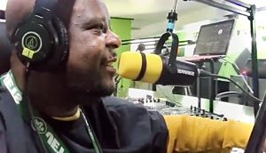 Turn up the Joy—With the soundboard laid in front and the radio crooning gospel, DJ Richie periodically slides the volume down to deliver motivational messages for his listeners.