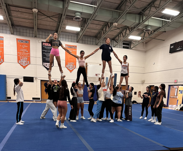 Let’s Go, Rebels!—In anticipation of their first meet, the cheerleading team has their first full run through, including their pyramid formation with fliers Amaya Thalappillil, Talia Soto, Meixi Lin, and Arianna He. 