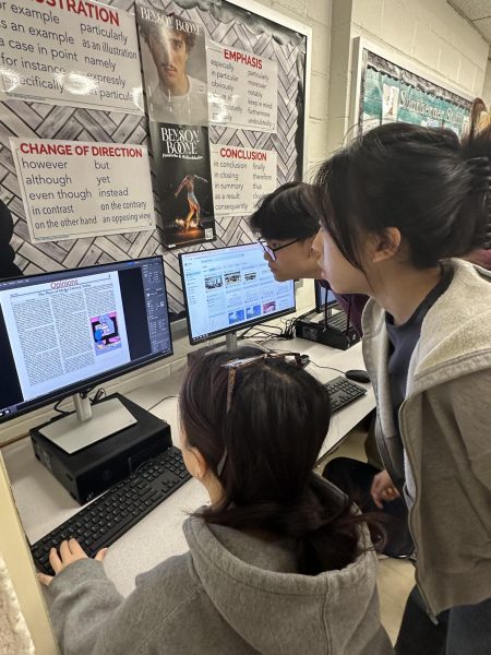 All Eyes on the Paper—Opinions Co-Editor Amelia Liao, Multimedia Editor Dylan Kim, and Print Managing Editor Audrey Huang proofread the print issue.