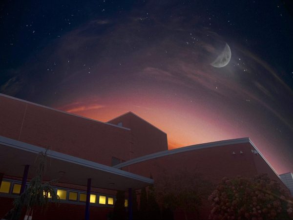 A Crescent Moon over a Quiet Campus—Even as darkness descends upon South High, the lively culture created by the students and the staff keeps the lights on well into the evening.