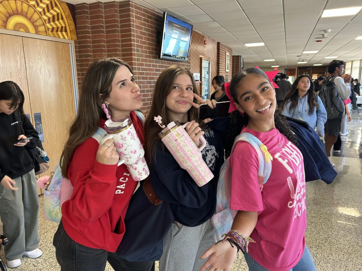 Stunning, Sparkling, Senior—(From the left) Seniors Isabella Ortellado, Michelle Harris, and Talía Soto radiate Classic confidence with patterned Stanleys and silly poses.