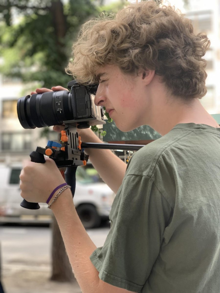 Building a filmmaking foundation—David Bernstein perfects his angle as he shoots a scene for Fixing the Past, a recently released short film of his. An attendee of the SOCAPA summer film program, Bernstein learned a range of film fundamentals: shot movements, camera functions, and story structure.