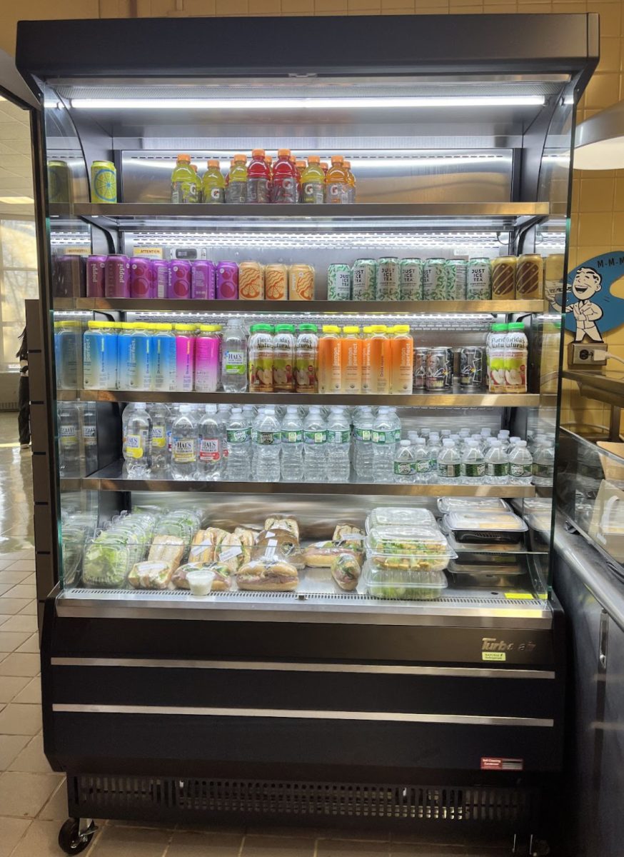 “‘Hot To Go’? Better yet, cold to go!”—The newly installed self-serve refrigerator in the upper cafeteria is stocked with a variety of meal options for busy students. These “quick-to-go” options sitting in the bottom shelf paired with the vast assortment of refreshing beverages readily available makes it easier than ever to grab a fast, nutritious, and appetizing lunch.