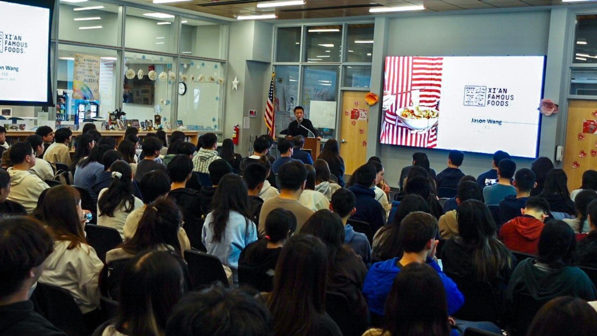 Events in the library - Speaker Jason Wang talks to students about his path and experiences. These common events in the library can provide many different benefits, such as insights and knowledge on unique paths and options that aren’t taught much in school.  (Photo courtesy of Ms. Jennifer Koo)
