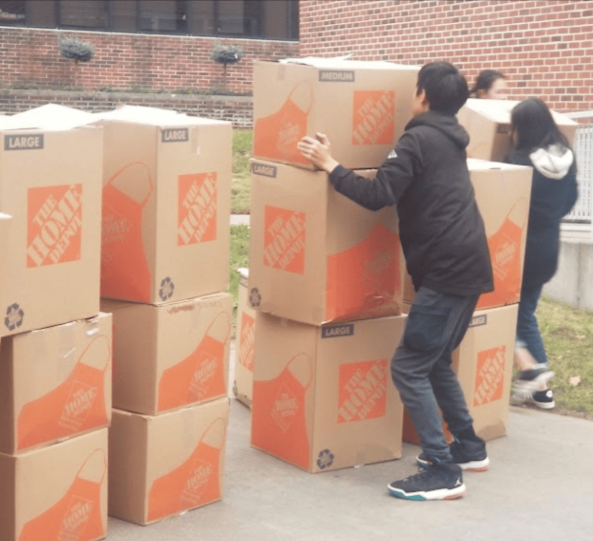It’s a Team Effort — Former Midnight Run members pack a truck of supplies being donated to soldiers at Fort Drum.
(Photo Courtesy of Ms. Michelle Sorise)