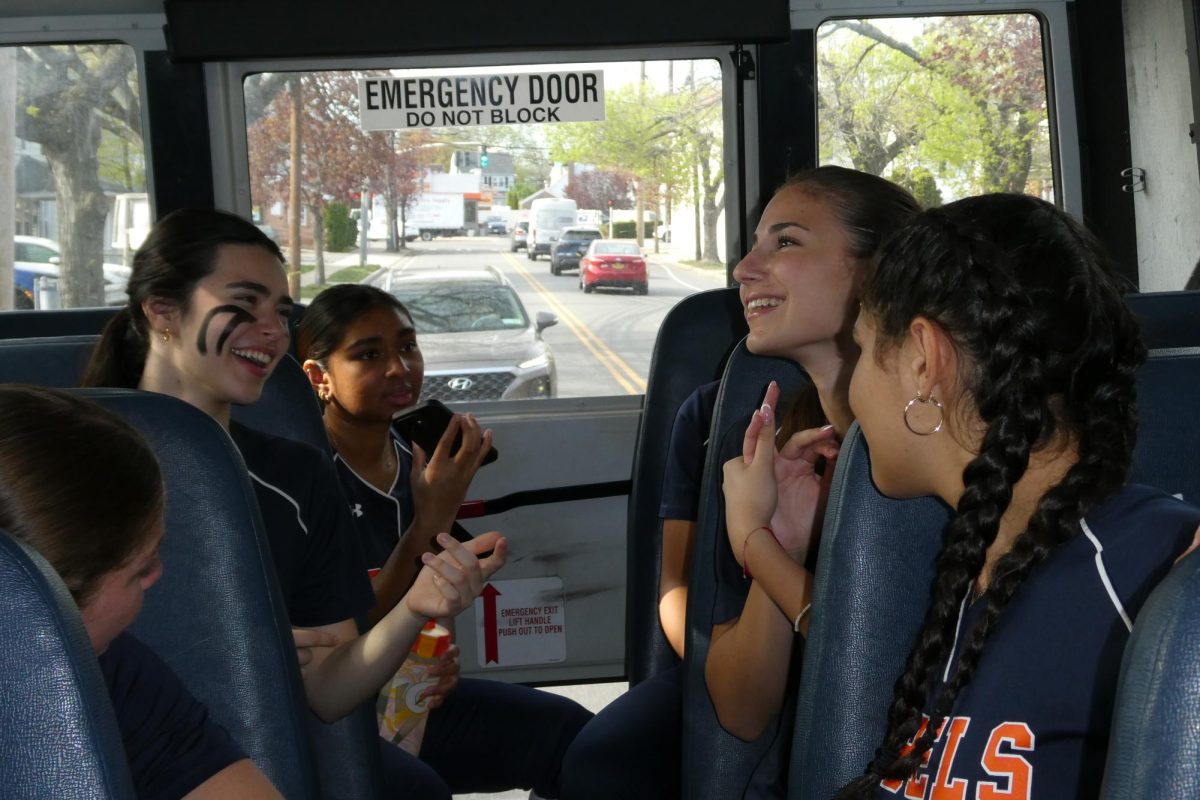 Team Bonding Continued — While bus rides to away games often consist of mental preparation, they also consist of lighthearted conversation that often bring the softball girls closer, tightening their bond. Their stronger bond makes for better friendships that translate into better teamwork and coordination on the field. 